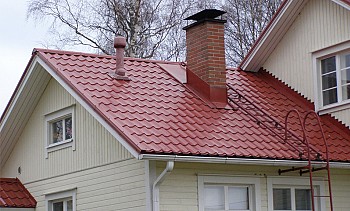 El dispositivo de un techo de una teja metálica