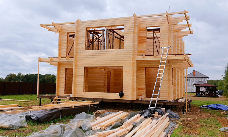 The technology of building a house from a double beam according to Finnish technology Warm house